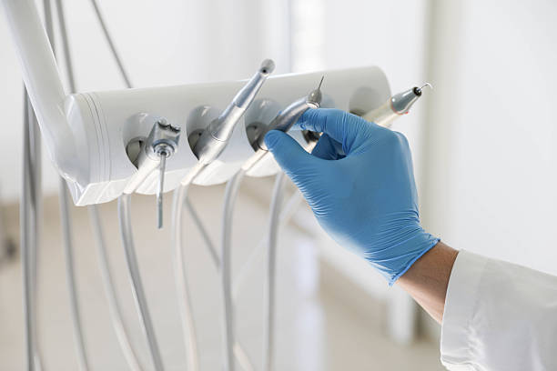 Professional Invisalign Clear Aligners technician working in Commerce, TX